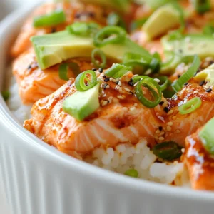 Exploring the fusion of sushi and baked dishes, Spicy Baked Salmon Sushi Delight offers a unique culinary experience that is both mouthwatering and visually stunning. This dish blends the creamy, spicy flavors of salmon with well-seasoned sushi rice, resulting in an enticing layered bake that captures the essence of traditional sushi while showcasing the comforting qualities of a baked meal. Each bite delivers a delightful combination of textures and flavors, making it a favorite among sushi enthusiasts and casual diners alike.