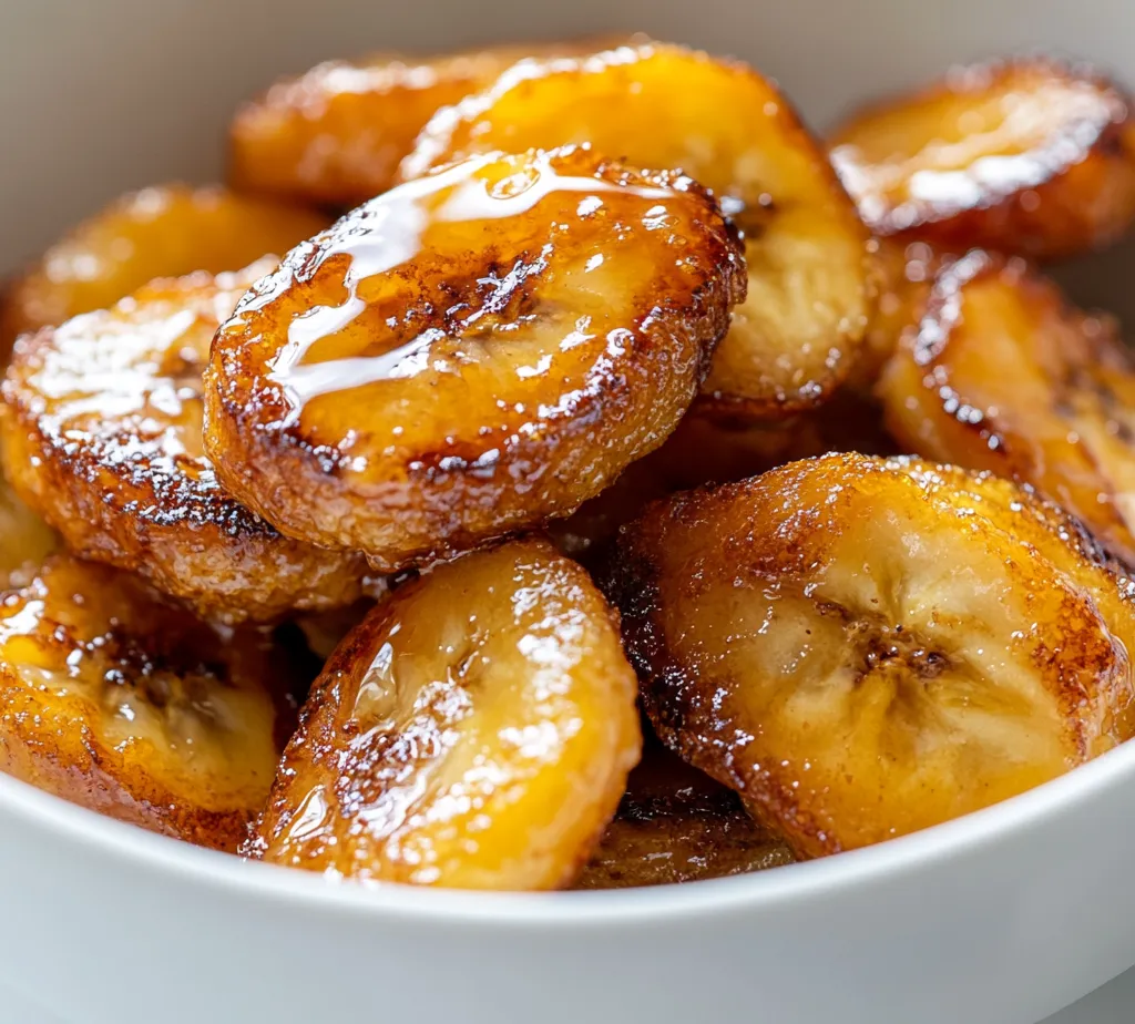Crispy Caramel Air-Fried Bananas are a delightful treat that perfectly combines sweet flavors with a satisfying crunch. This easy recipe transforms ripe bananas into a heavenly dessert that is ideal for both indulgent snacks and elegant dinner parties. The sweetness of the bananas is complemented by a caramelized coating of brown sugar and cinnamon, making this a crowd-pleaser for all ages. Enjoy them warm, drizzled with honey or maple syrup, and garnish with fresh mint leaves for an inviting presentation.