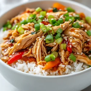 The Savory Slow Cooker Teriyaki Chicken and Rice Bowl is a beloved dish that perfectly blends convenience and flavor, making it ideal for busy weeknights or family dinners. The combination of tender chicken, fluffy jasmine rice, and vibrant mixed vegetables, all slow-cooked in a rich, savory teriyaki sauce, creates a hearty and satisfying meal. This dish appeals to a wide variety of tastes, especially those who enjoy the fragrant and sweet flavors typical of Asian cuisine.